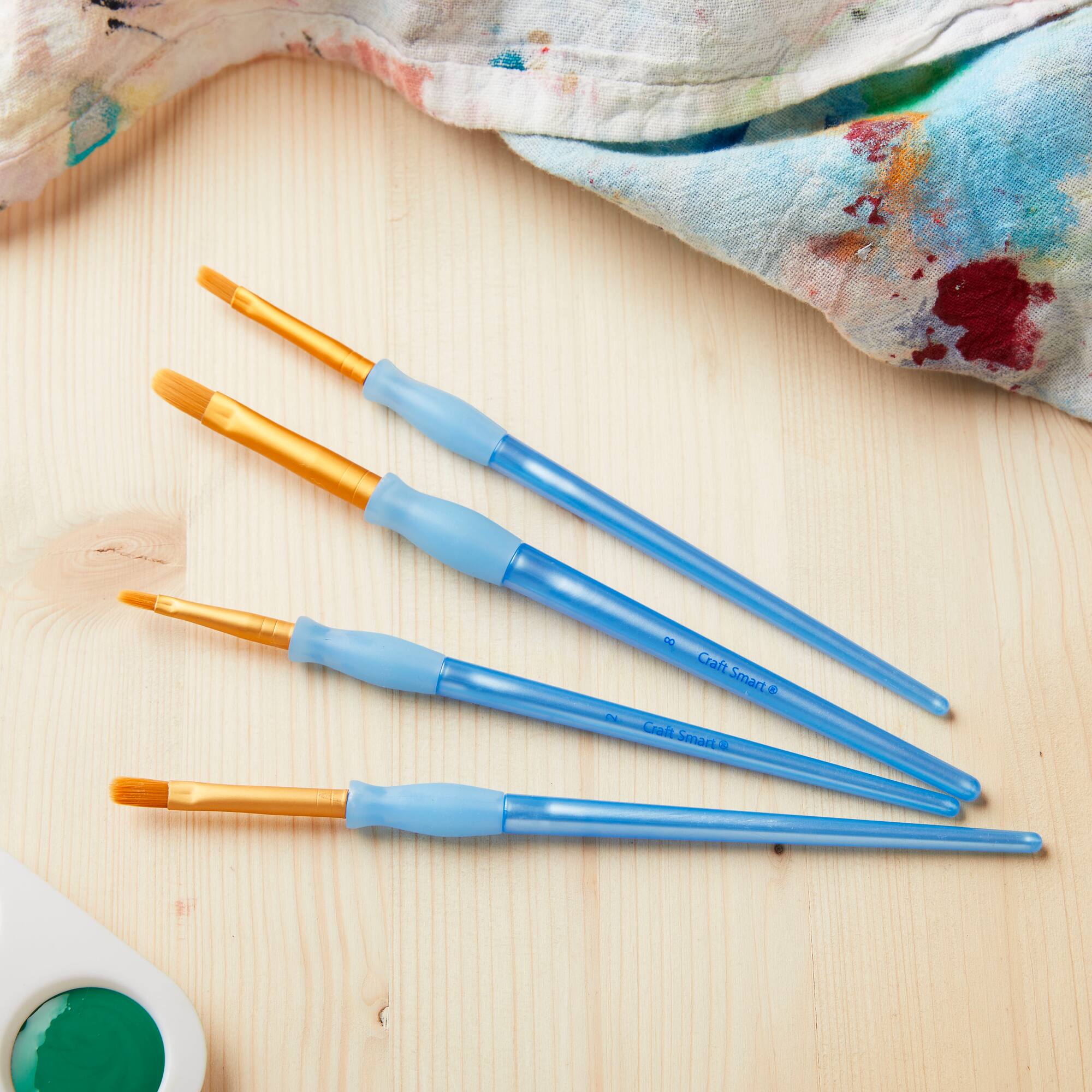 9 Packs: 4 ct. (36 total) Filbert Golden Taklon Brush Set by Craft Smart®